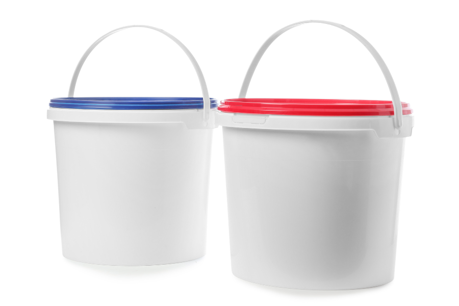 Two white injection-moulded pails with contrasting blue and red lid rims
